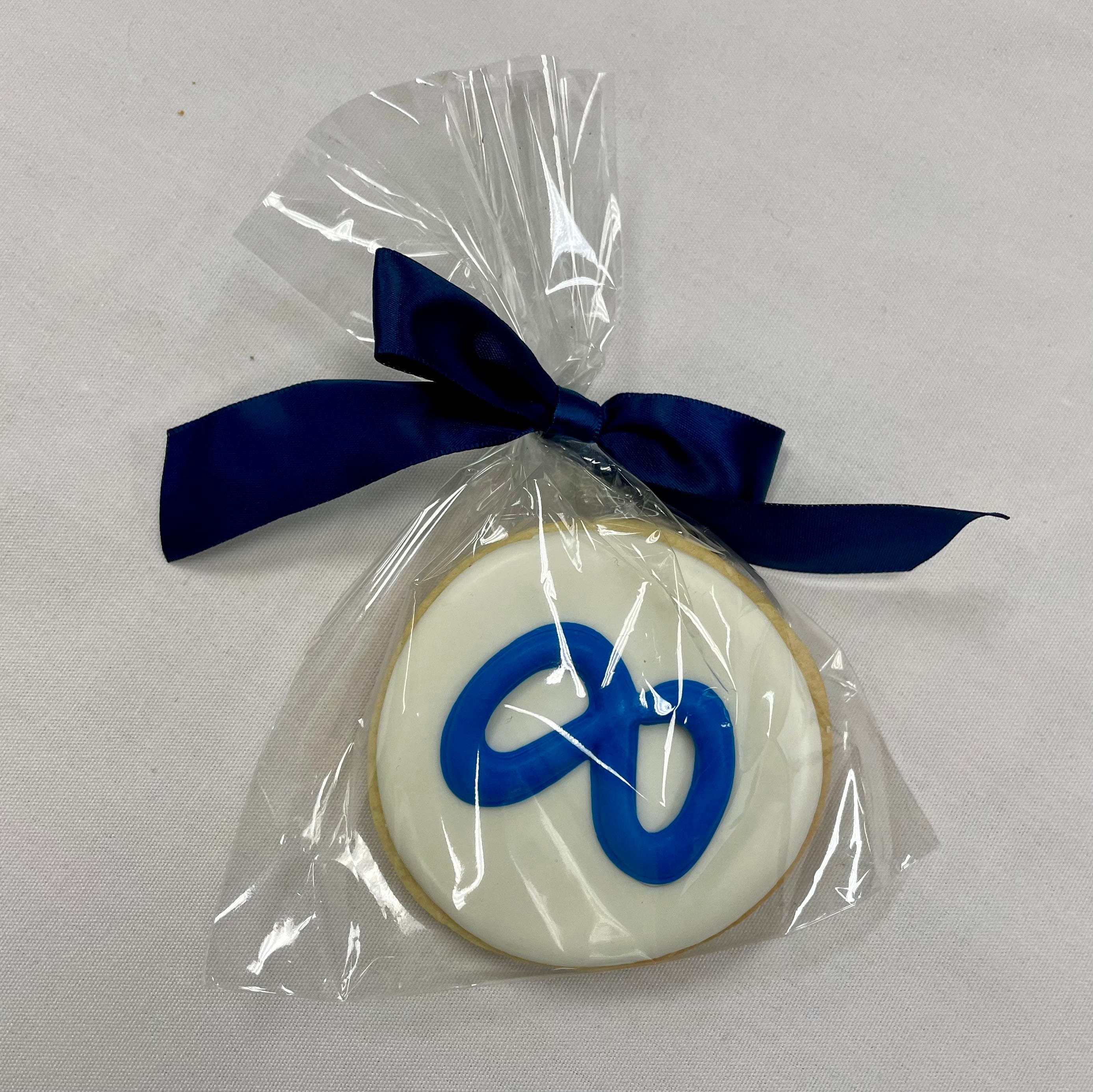 Sugar cookie with the Meta logo on it