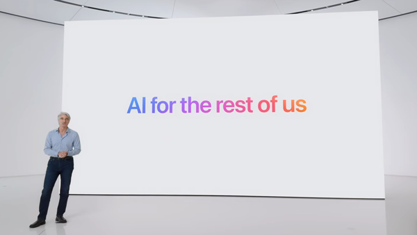 Craig Federighi in front of a screen that says “AI for the rest of us”